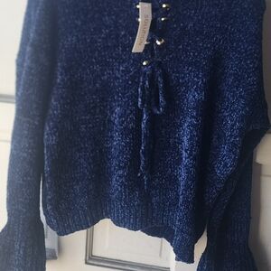 Luxurious Navy V-Neck Sweater by Solutions. Decorations Gold. Festive